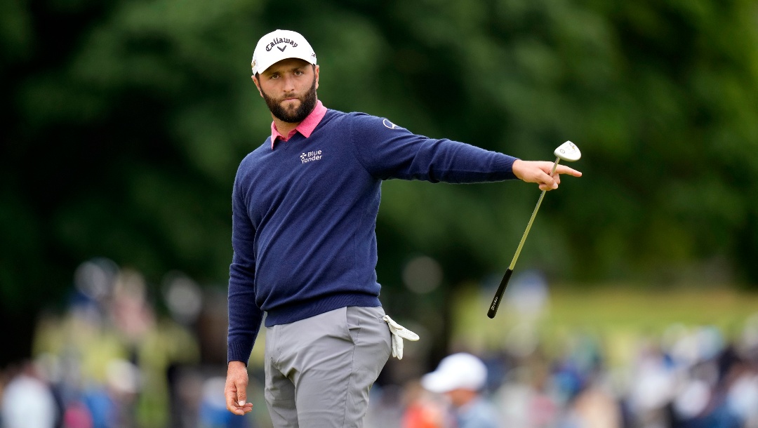 Jon Rahm, of Spain, reacts after a putt on the second hole during the final round of the U.S. Open golf tournament at The Country Club, Sunday, June 19, 2022, in Brookline, Mass. (AP Photo/Charles Krupa)