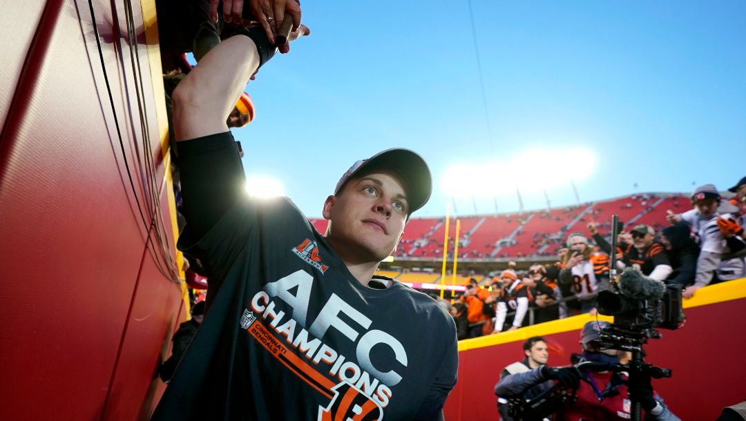 Cincinnati Bengals quarterback Joe Burrow celebrates with fans after the AFC championship