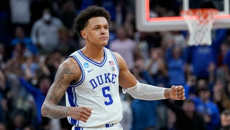 Duke forward Paolo Banchero (5) celebrates during the first half of a college basketball game against Arkansas in the Elite 8 round of the NCAA men's tournament in San Francisco, Saturday, March 26, 2022.