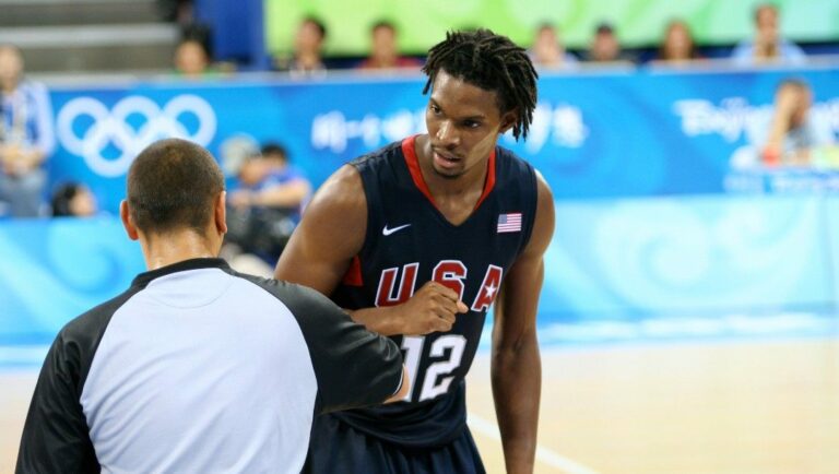 Chris Bosh talks with a referee.