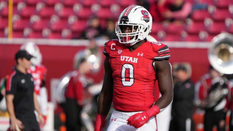 Utah linebacker Devin Lloyd (0) warms up before an NCAA college football game against Colorado Friday, Nov. 26, 2021, in Salt Lake City.