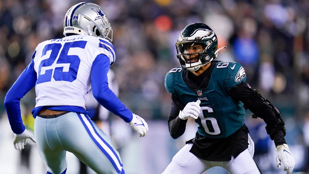 Philadelphia Eagles wide receiver DeVonta Smith (6) runs a route against Dallas Cowboys cornerback Nahshon Wright (25) during the first half of an NFL football game between the Philadelphia Eagles and the Dallas Cowboys, Monday, Jan. 10, 2022, in Philadelphia. The Cowboys won 51-26. (AP Photo/Julio Cortez)