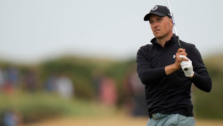 Jordan Spieth of the US watches his shot on the 11th hole during the final round of the British Open golf championship on the Old Course at St. Andrews, Scotland, Sunday July 17, 2022. (AP Photo/Alastair Grant)