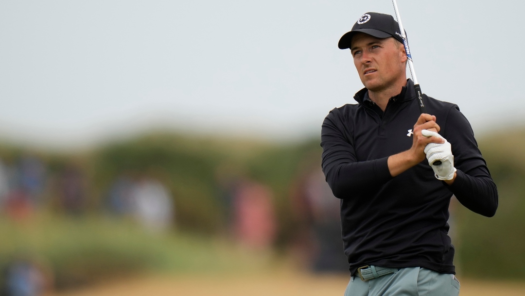 Jordan Spieth of the US watches his shot on the 11th hole during the final round of the British Open golf championship on the Old Course at St. Andrews, Scotland, Sunday July 17, 2022. (AP Photo/Alastair Grant)