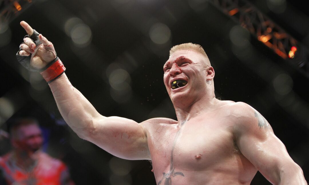 Brock Lesnar celebrates his UFC heavyweight mixed martial arts title
