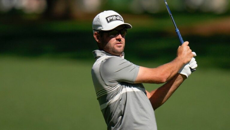 Corey Conners, of Canada, plays during the second round at the Masters golf tournament on Friday, April 8, 2022, in Augusta, Ga.