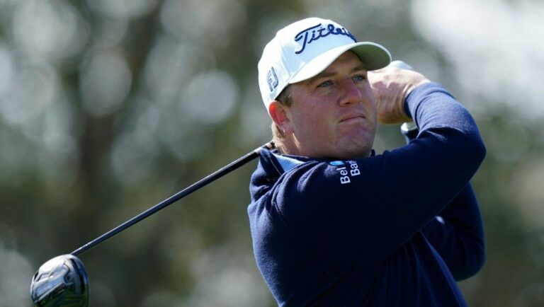 Tom Hoge hits from the ninth tee during the second round of play in The Players Championship golf tournament Sunday, March 13, 2022, in Ponte Vedra Beach, Fla.