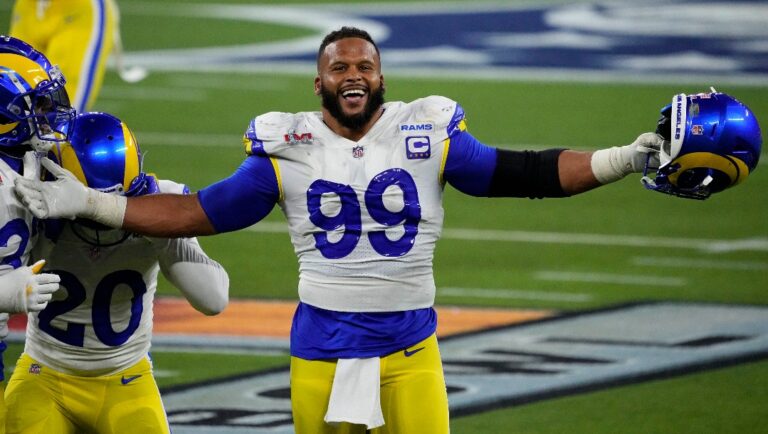 Los Angeles Rams defensive end Aaron Donald (99) celebrates after the NFL Super Bowl 56 football game against the Cincinnati Bengals, Sunday, Feb. 13, 2022, in Inglewood, Calif. (AP Photo/Elaine Thompson)
