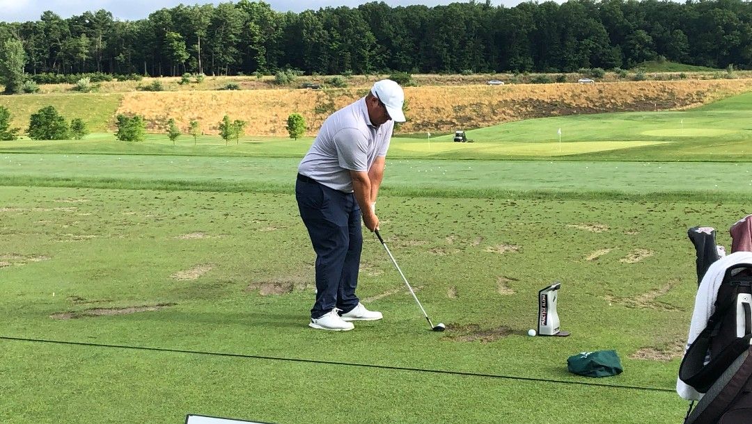 Conrad Shindler warms up prior to the first round of the Travelers Championship.