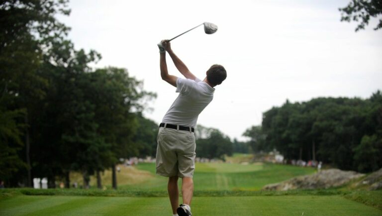 Matthew Fitzpatrick, 18, of England, hits of the 10th tee, the 28th tee of play, during the 36-hole championship match of the U.S. Amateur golf tournament at The Country Club in Brookline, Mass., Sunday, Aug. 18, 2013.