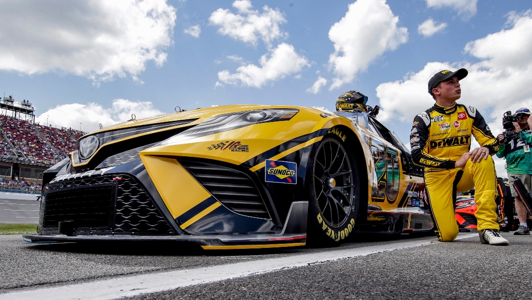 Christopher Bell gets ready to lead the start of a NASCAR Cup Series auto race Sunday, April 24, 2022, in Talladega, Ala. (AP Photo/Butch Dill)
