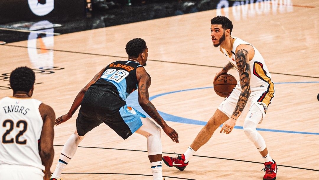 Lonzo Ball at the top of the key.