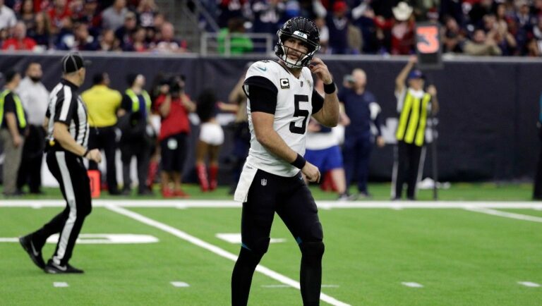 Jacksonville Jaguars quarterback Blake Bortles (5) walks off the field during the first half of an NFL football game against the Houston Texans, Sunday, Dec. 30, 2018, in Houston.