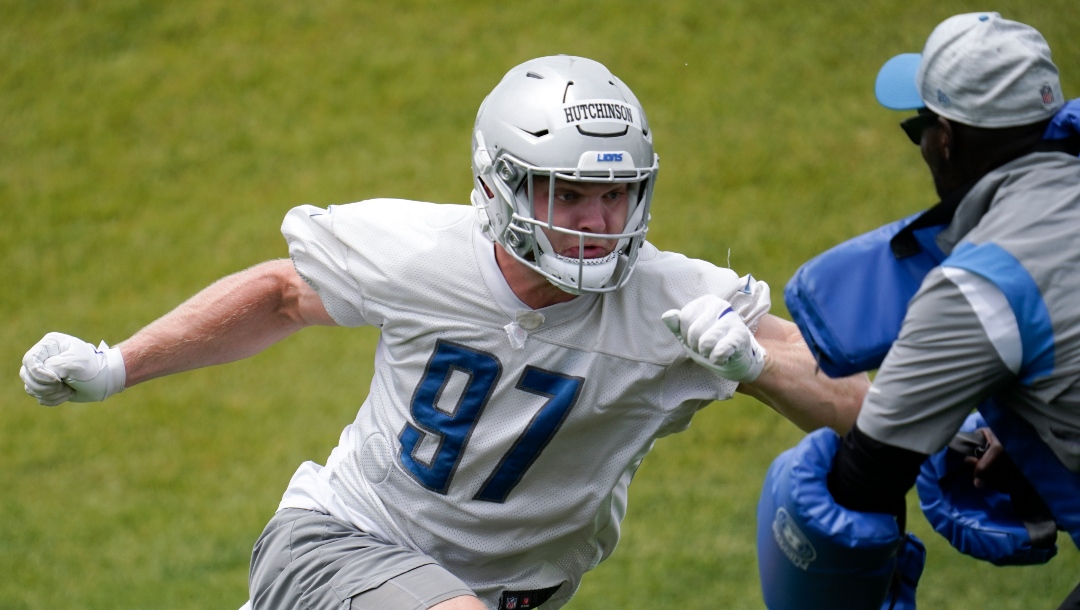 Detroit Lions defensive end Aidan Hutchinson runs a drill during an NFL football practice in Allen Park, Mich., Wednesday, June 8, 2022. (AP Photo/Paul Sancya)