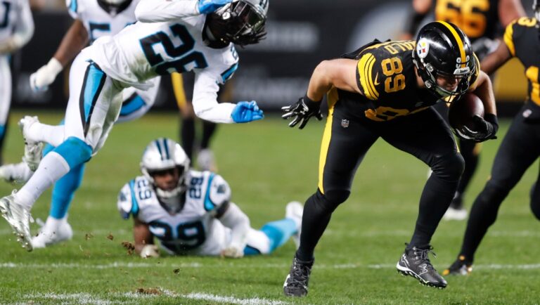 FILE - In this Nov. 8, 2018, file photo, Pittsburgh Steelers tight end Vance McDonald (89) runs with the ball during the team's NFL football game against the Carolina Panthers in Pittsburgh. Among the Panthers defenders are Mike Adams (29) and Shaq Thompson (54). The Panthers have been a perennial top 10 defense since middle linebacker Luke Kuechly’s arrival in 2012, making their performance against Pittsburgh all that much more surprising. The Steelers scored on seven of their first eight possessions; the only time they failed to do so was when they took a knee before halftime to run out the clock. (