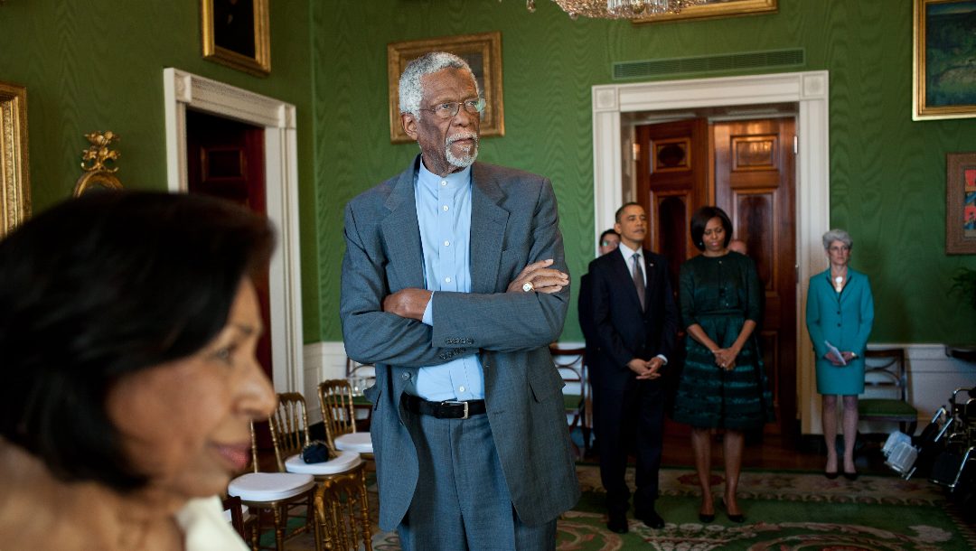 President Barack Obama and First Lady Michelle Obama wait in the Green Room of the White House with Sylvia Mendez and Bill Russell as recipients of the 2010 Presidential Medal of Freedom are introduced in the East Room, Feb. 15, 2011.