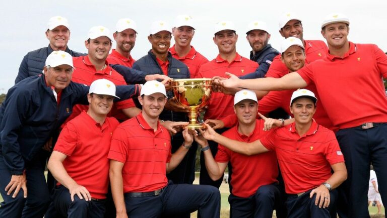 The U.S. team hold their trophy after they won the President's Cup golf tournament at Royal Melbourne Golf Club in Melbourne, Sunday, Dec. 15, 2019. The U.S. team won the tournament 16-14.