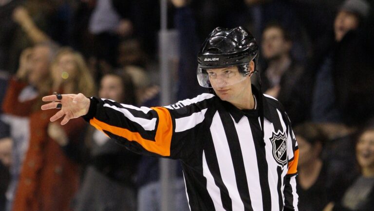Linesman Marcus Vinnerborg signals goal by Dallas Stars center Brad Richards (91) following a video review in the third period of an NHL hockey game against the Anaheim Ducks Tuesday, Nov. 16, 2010, in Dallas.