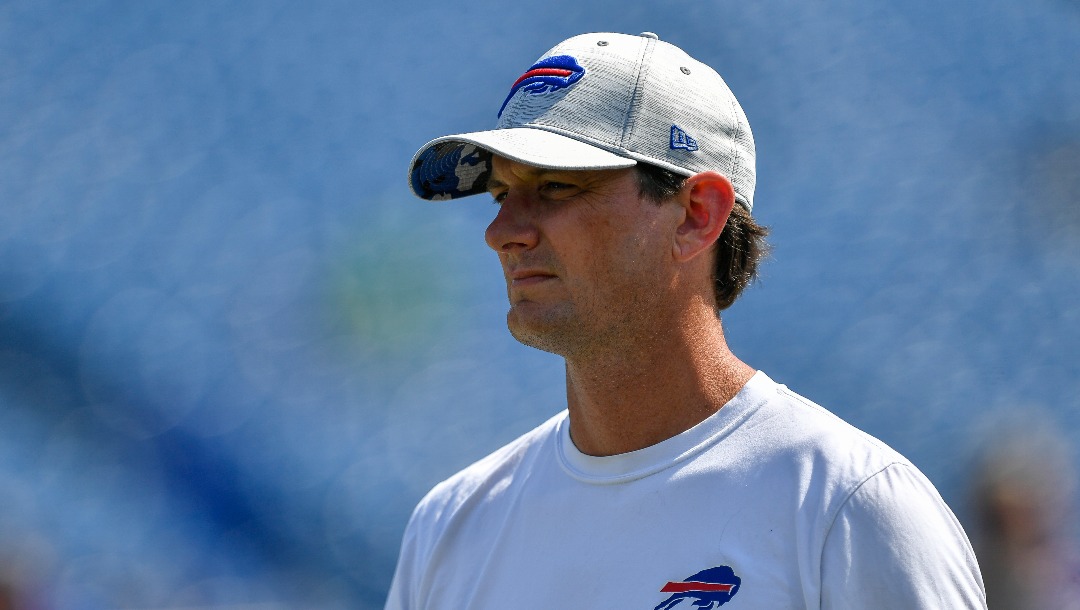 Buffalo Bills offensive coordinator Ken Dorsey walks on the field before a preseason NFL football game against the Denver Broncos in Orchard Park, N.Y., Saturday, Aug. 20, 2022. (AP Photo/Adrian Kraus)