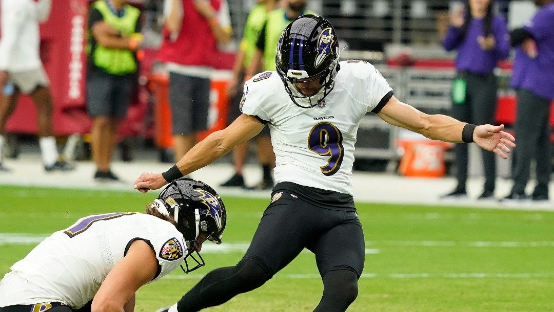 Baltimore Ravens kicker Justin Tucker (9) practices before an NFL preseason football game against the Arizona Cardinals, Sunday, Aug. 21, 2022, in Glendale, Ariz.