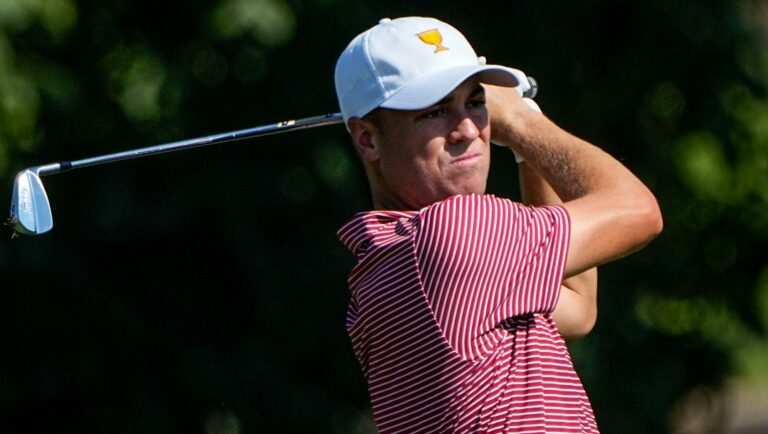Justin Thomas hits from the 13th tee during practice for the Presidents Cup golf tournament at the Quail Hollow Club, Tuesday, Sept. 20, 2022, in Charlotte, N.C.