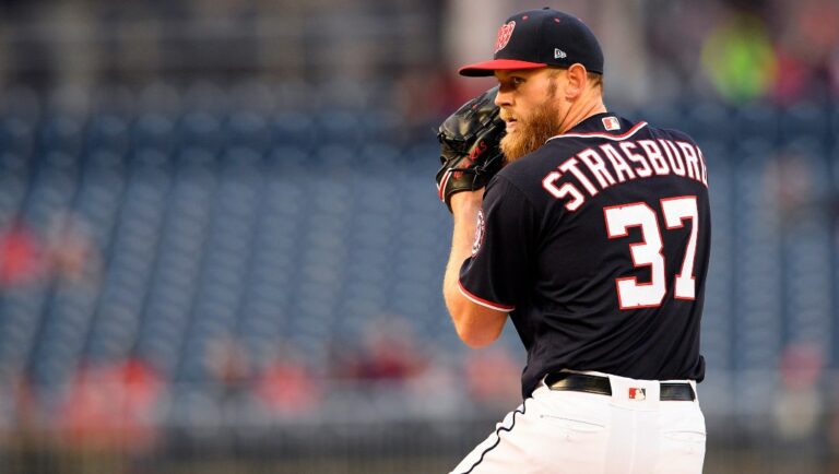 Washington Nationals starting pitcher Stephen Strasburg (37) looks to the batter during the first inning of a baseball game against the Arizona Diamondbacks, Friday, April 27, 2018, in Washington.