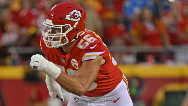 Kansas City Chiefs defensive end George Karlaftis (56) rushes