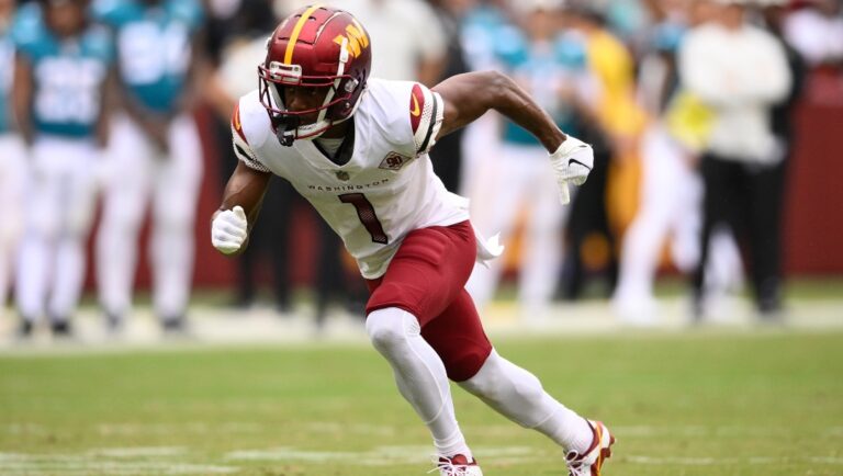 Washington Commanders wide receiver Jahan Dotson (1) runs