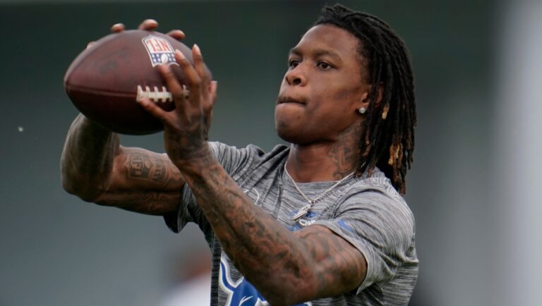 Detroit Lions wide receiver Jameson Williams catches a ball