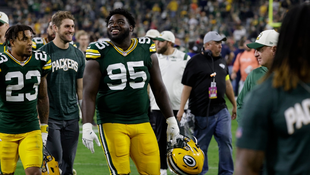 Green Bay Packers defensive tackle Devonte Wyatt (95) smiles