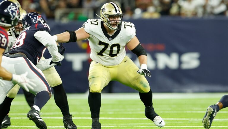 New Orleans Saints offensive lineman Trevor Penning (70) looks to block