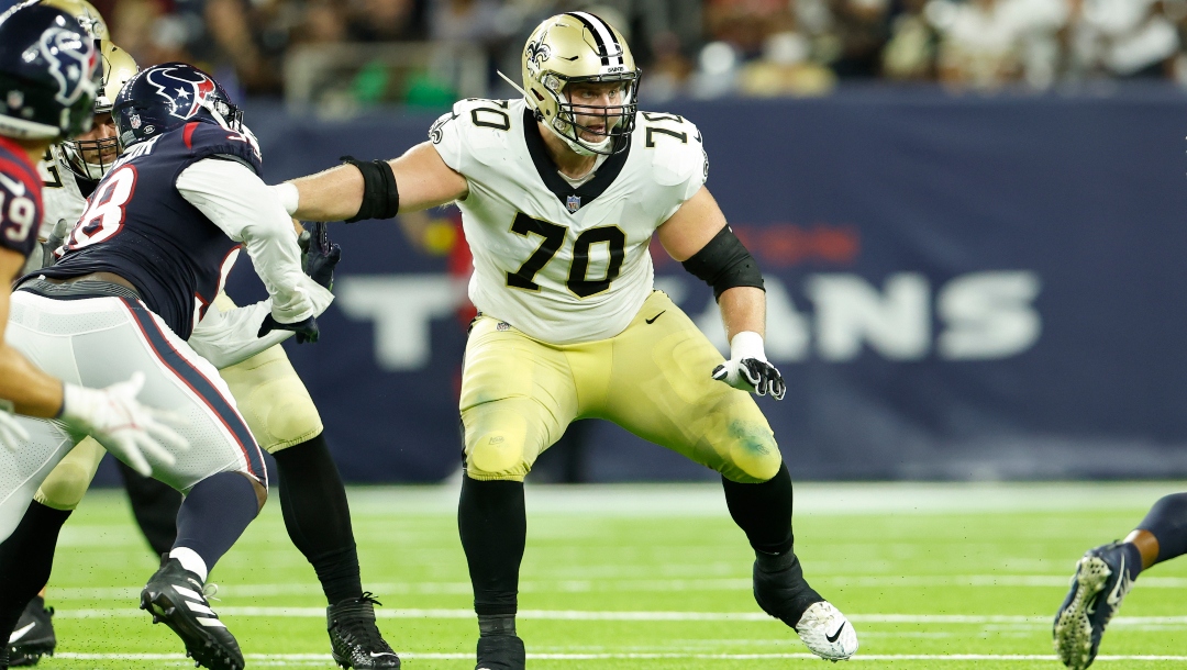 New Orleans Saints offensive lineman Trevor Penning (70) looks to block