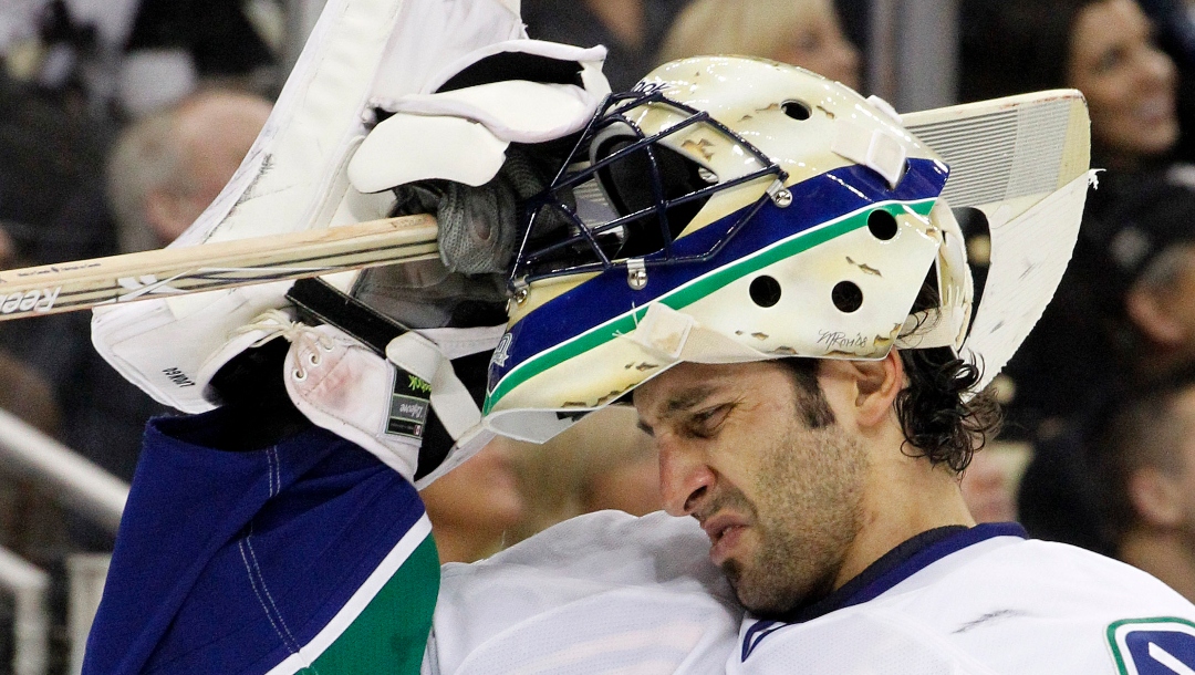 Vancouver Canucks goalie Roberto Luongo skates back to the goal after a time-out in the second period of an NHL hockey game against the Pittsburgh Penguins in Pittsburgh, Wednesday, Nov. 17, 2010, in Pittsburgh.