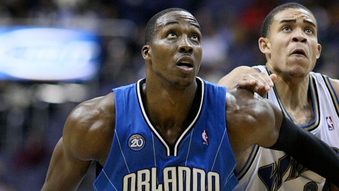 Dwight Howard battles a rebound against JaVale McGee in an NBA game in 2008.