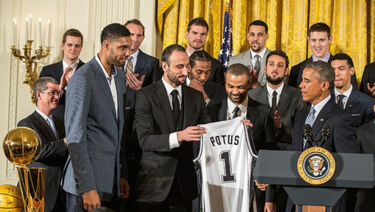 Tim Duncan, Manu Ginobili and Tony Parker present President Barack Obama with a Spurs team jersey during an event to welcome the 2014 NBA Champion San Antonio Spurs.