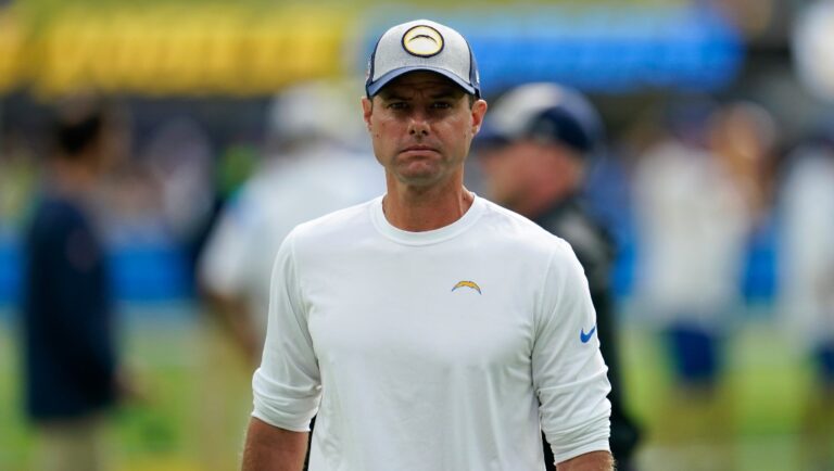 Los Angeles Chargers head coach Brandon Staley walks on the field as players warm up before an NFL football game against the Seattle Seahawks Sunday, Oct. 23, 2022, in Inglewood, Calif. (AP Photo/Marcio Jose Sanchez)