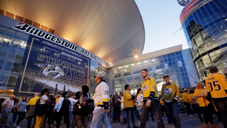 FILE - In this April 10, 2019, file photo, fans arrive at Bridgestone Arena for Game 1 of an NHL hockey first-round playoff series between the Nashville Predators and the Dallas Stars in Nashville, Tenn. The NHL will holding its awards and draft in Music City in June 2023, the first time the league has held both in the same city since 2006, the league announced Thursday, Aug. 18, 2022. (AP Photo/Mark Humphrey, FIle)