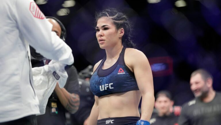 Rachael Ostovich reacts after losing a women's flyweight mixed martial arts bout against Paige Vanzant at UFC Fight Night.