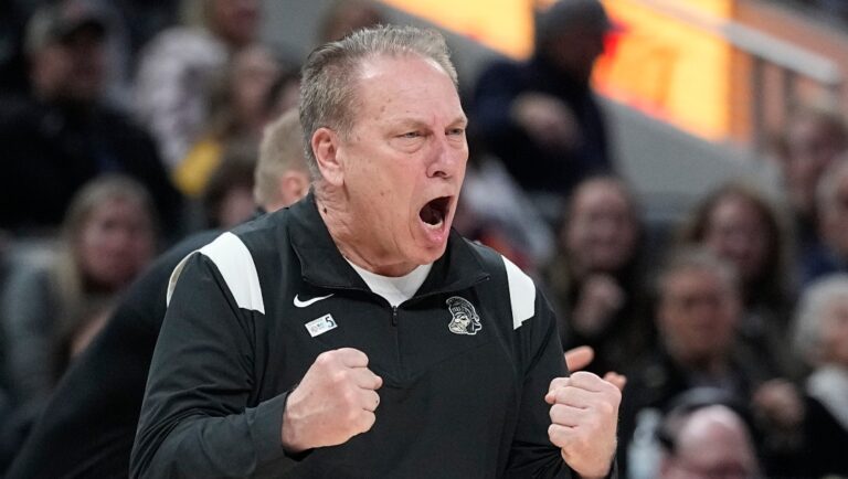 FILE - Michigan State coach Tom Izzo shouts during the second half of the team's NCAA college basketball game against Wisconsin at the Big Ten Conference men's tournament Friday, March 11, 2022, in Indianapolis. Michigan State has signed Izzo to a new deal valued at $6.2 million per season, giving him about $2 million more each year. The school announced the deal Thursday, Aug. 11, 2022, saying that the five-year rollover contract will need to be approved by its board next month. (AP Photo/Darron Cummings, File)