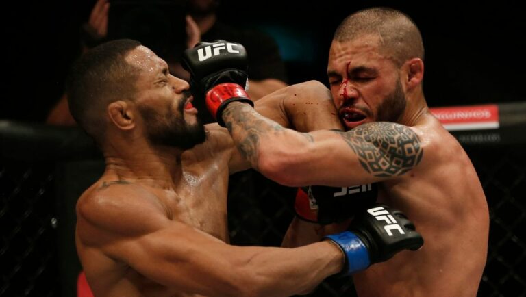 Deiveson Figueiredo, left, of Brazil, fights Marco Beltran of Mexico during their UFC bantamweight mixed martial arts bout.