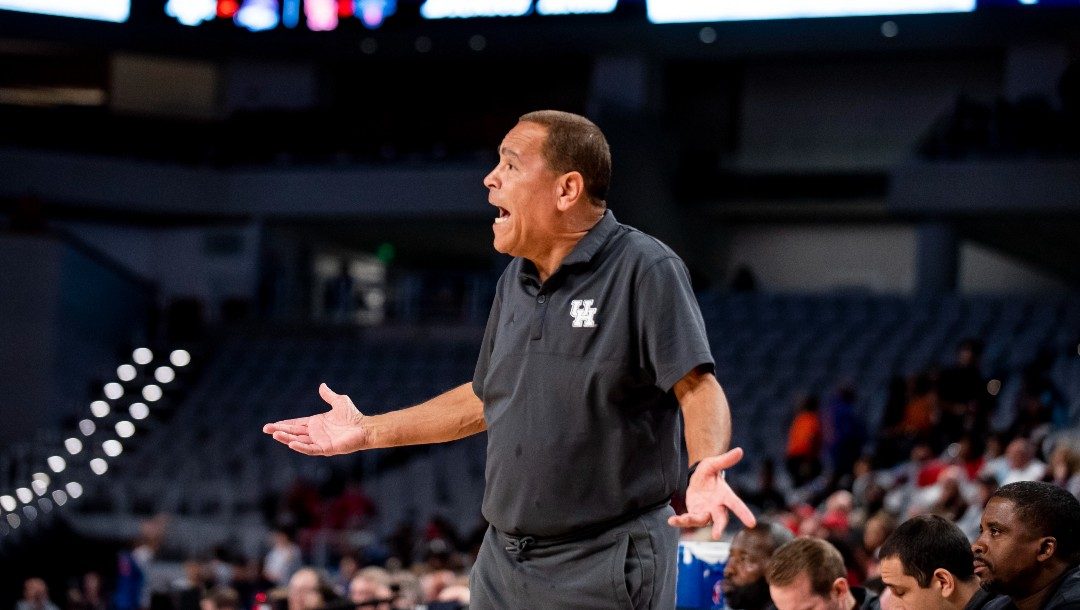 Houston coach Kelvin Sampson speaks to an official after a play during the first half of the team's NCAA college basketball game against Saint Mary's in Fort Worth, Texas, Saturday, Dec. 3, 2022.