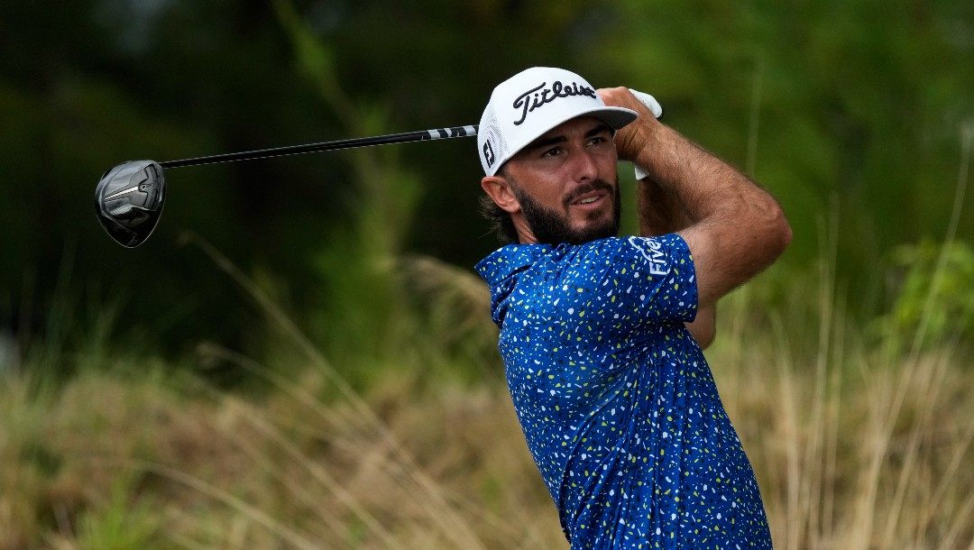 Max Homa, of the United States, watches his shot on the 10th tee during a practice round of the Hero World Challenge PGA Tour at the Albany Golf Club, in New Providence, Bahamas, Wednesday, Nov. 30, 2022.
