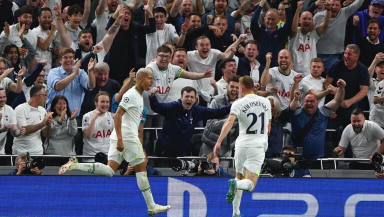 Tottenham's Richarlison, left, celebrates after scoring his side's second goal during the Champions League soccer match between Tottenham Hotspur and Olympique de Marseille at Tottenham Hotspur stadium, in London, England, Wednesday, Sept. 7, 2022.