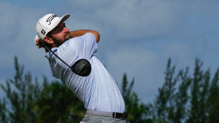 Cameron Young, of the United States, watches his tee shot on the fourth tee during the final round of the Hero World Challenge PGA Tour at the Albany Golf Club, in New Providence, Bahamas, Sunday, Dec. 4, 2022.