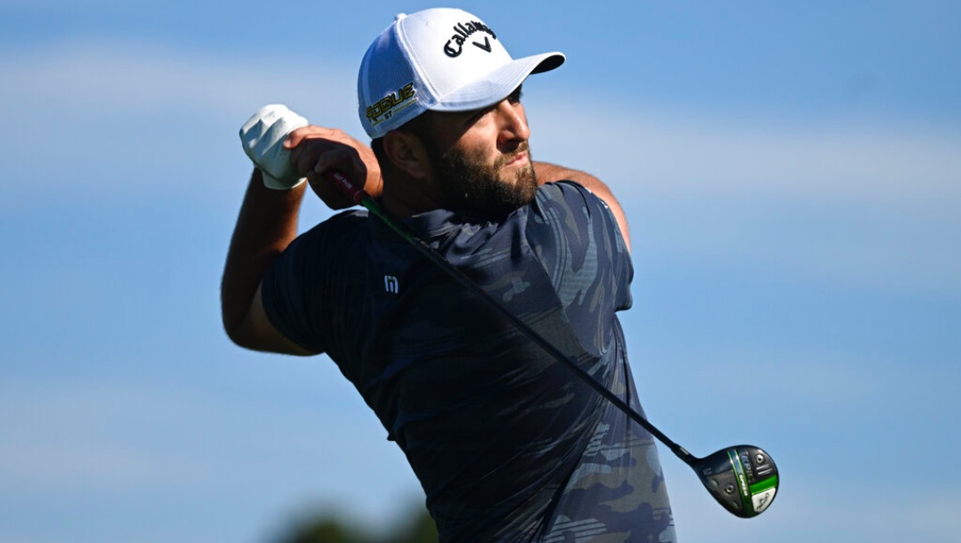 Jon Rahm of Spain hits his tee shot on the second hole of the South Course at Torrey Pines during the first round of the Farmers Insurance Open golf tournament, Wednesday, Jan. 26, 2022, in San Diego.