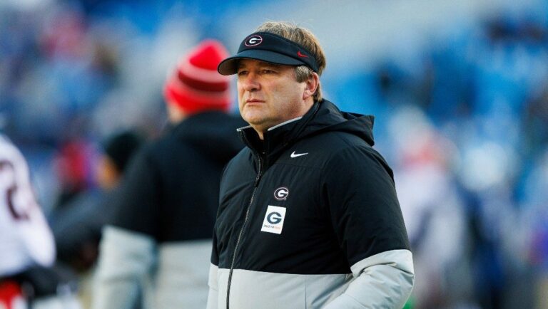Georgia head coach Kirby Smart watches his team warm up before an NCAA college football game in Lexington, Ky., Saturday, Nov. 19, 2022.
