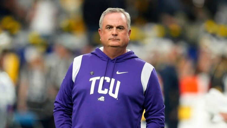 TCU head coach Sonny Dykes watches his players prior to the Fiesta Bowl NCAA college football semifinal playoff game against Michigan, Saturday, Dec. 31, 2022, in Glendale, Ariz.