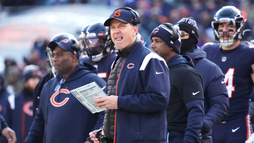 Chicago Bears head coach Matt Eberflus checks a score board during the second half of an NFL football game against the Minnesota Vikings, Sunday, Jan. 8, 2023, in Chicago. The Vikings won 29-13.
