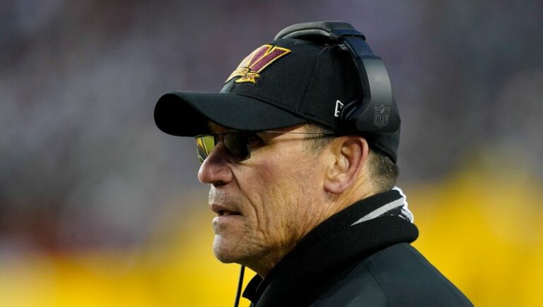 Washington Commanders head coach Ron Rivera watches the first half of an NFL football game against the Dallas Cowboys, Sunday, Jan. 8, 2023, in Landover, Md.