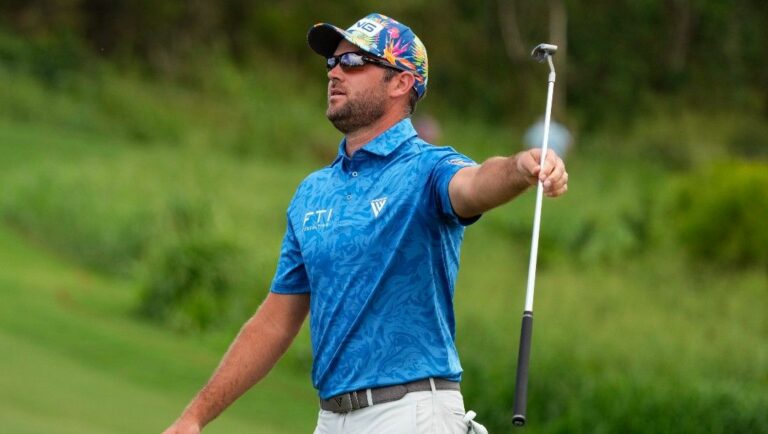 Corey Conners, of Canada, reacts after missing his birdie putt on the 17th green during the third round of the Tournament of Champions golf event, Saturday, Jan. 7, 2023, at Kapalua Plantation Course in Kapalua, Hawaii.